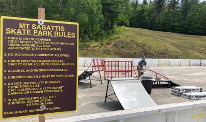 A sign for a skate park