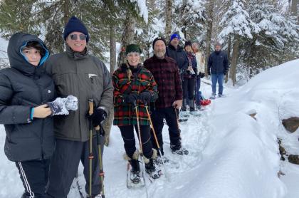Group snowshoeing on tour