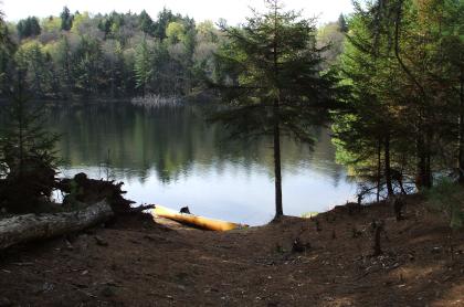 The tranquil waters of Little Tupper Lake beckon the paddler&#44; angler&#44; and backcountry camper.