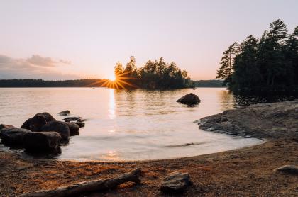 A shoreline during sunset