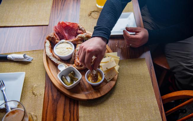 Close-up view of a charcuterie platter on a restaurant table.