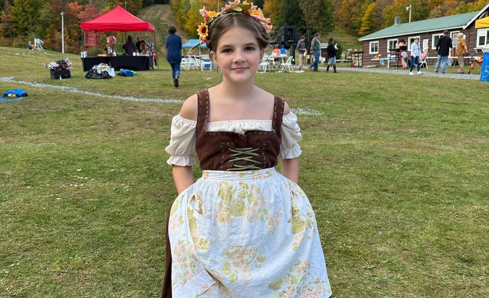 A girl dressed in German costume for Oaktoberfest