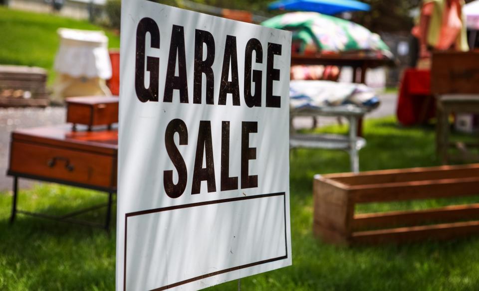 Garage Sale Sign in a yard