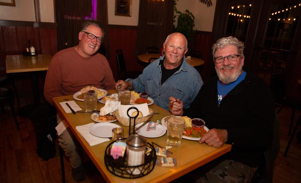 Men eating enjoying