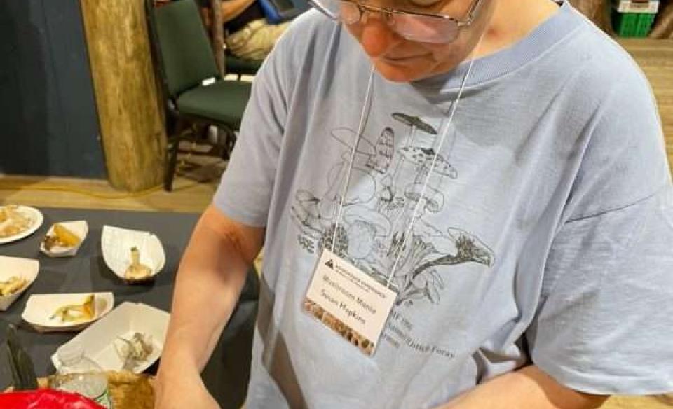 A woman shows products made from mushrooms