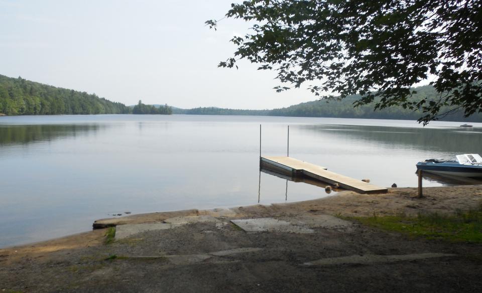 The Eighth Lake boat launch has a hard surface ramp and pier.